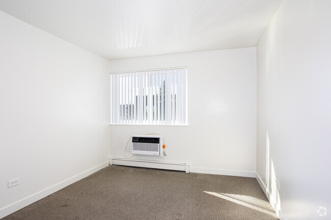 3BR, 2BA - 921SF - Primary Bedroom - Grace Apartments