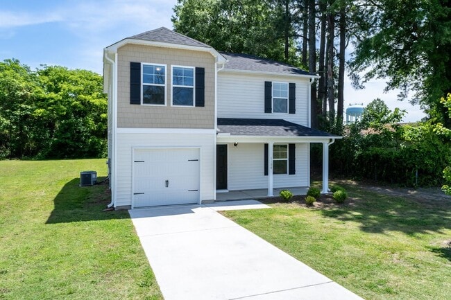Building Photo - Modern Four Bedroom Home