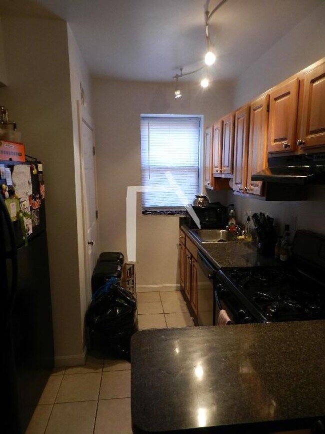 Photo - Renovated 3 bed. 1.5 bathroom on Cleveland Circle. Parking for Rent. Laundry is in the Building.