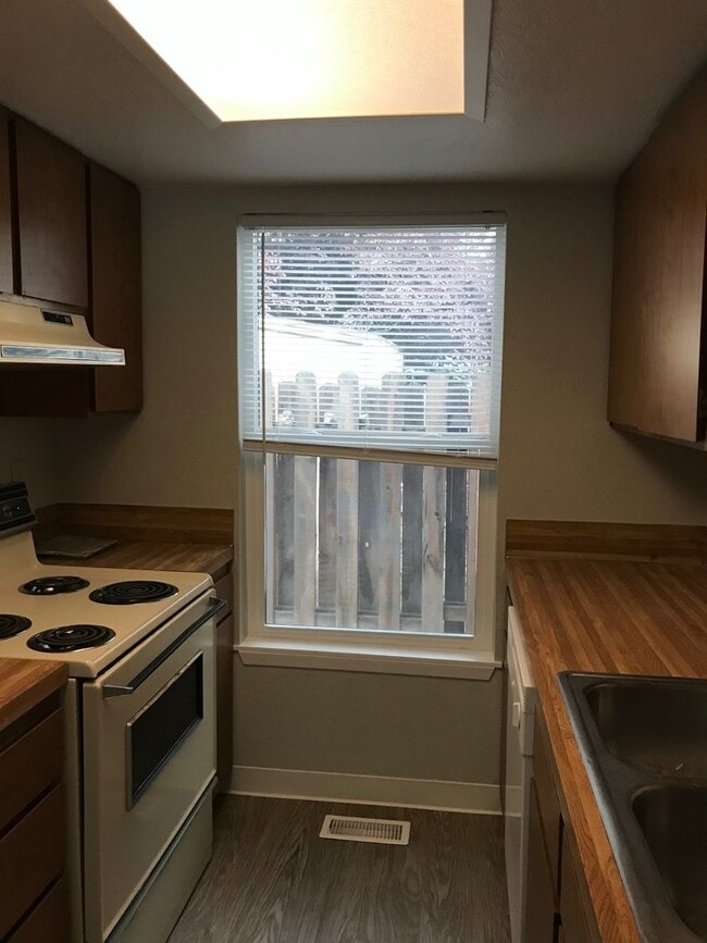 Photo - Updated 2 BR / 1.5 BA End Unit – Private Yard & Fresh Interior!