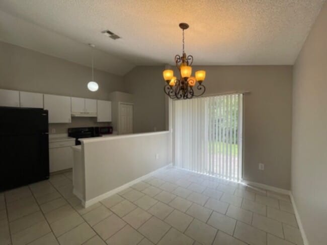 Photo - 3 Bed, 2 Bath, ALL Tile Floors, Garage!