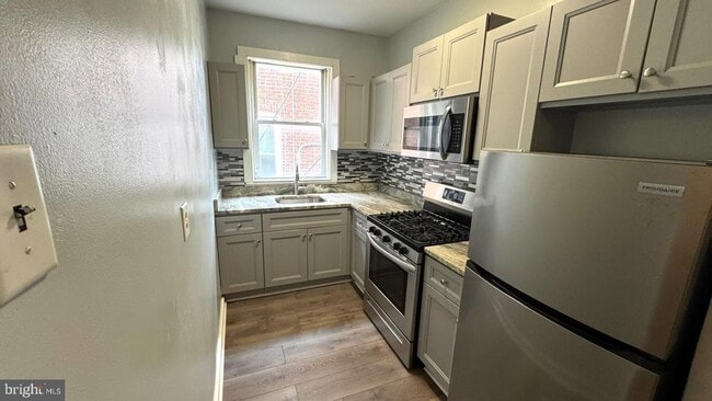 Building Photo - 4724 Frederick Ave Unit 1 Rental