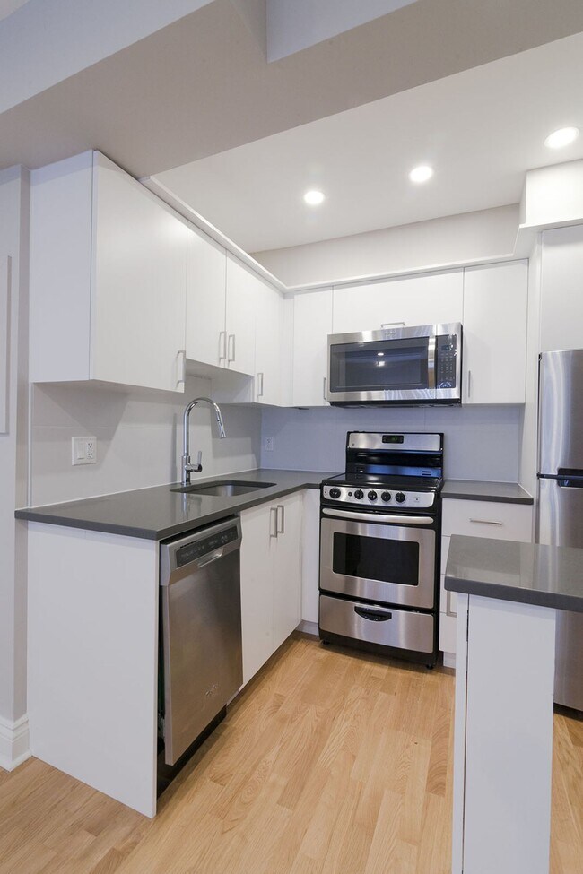 Photo - 25 Av des Pins O Unité 545