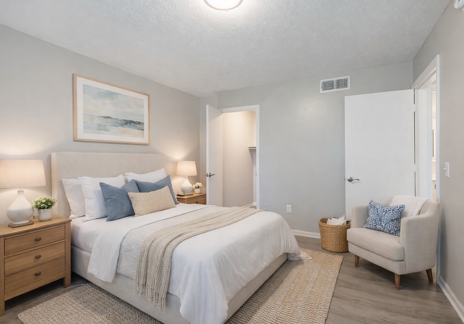 Cozy neutral-toned bedroom retreat - Lexington Springs Apartments