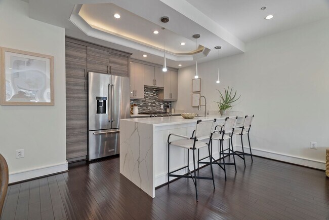 Photo - 16th St Condo with Modern Finishes and Wai...