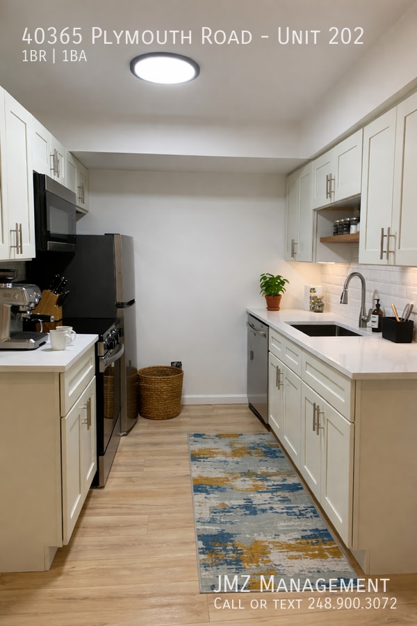 Building Photo - 40365 Plymouth Rd Unit 202