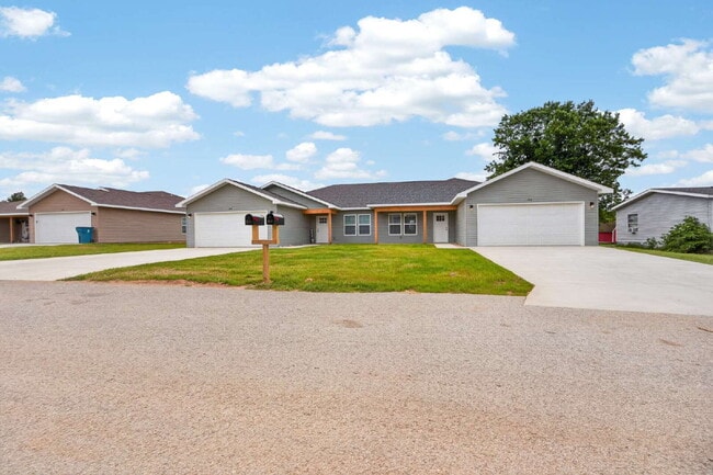 Building Photo - BRAND-NEW 4BR/2BA Duplex/Patio home with Garage - Available Now near Hollister, Schools
