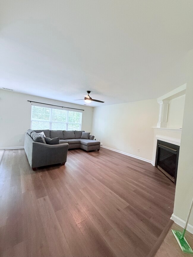 Living room with gas fireplace - 8253 Belmont Stables Dr