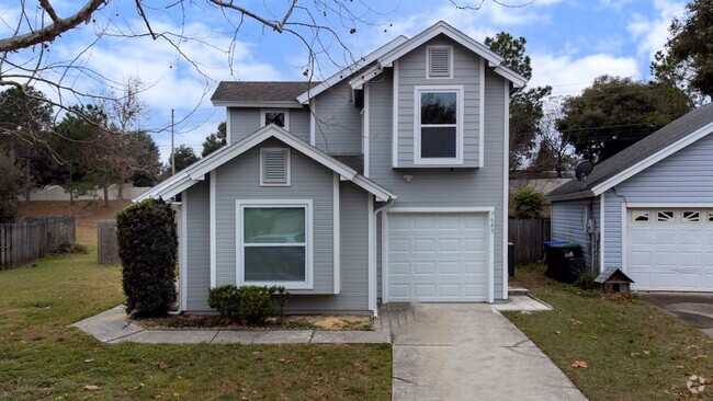 Building Photo - Remodeled and Updated 3/2 House with Garag...