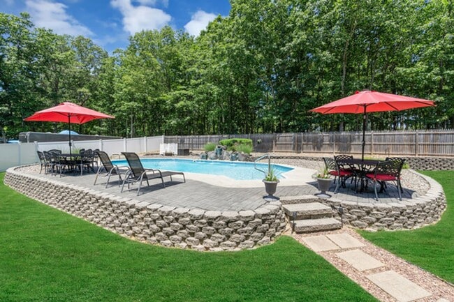 Photo - Private Cul-de-Sac Living: 4BR Home with Pool & Geothermal HVAC