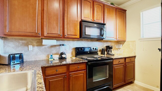 Photo - Move-in ready and Fully Furnished! This beautifully maintained 3-bedroom, 3-bath Condo offers a R...