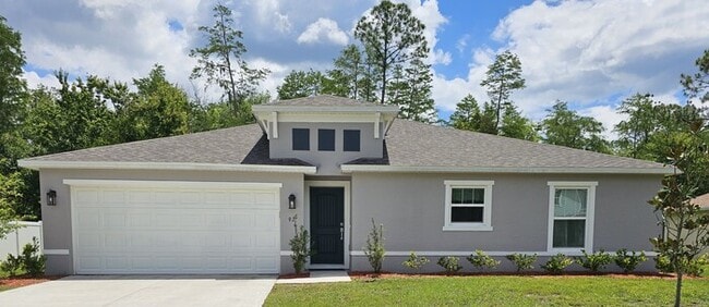 Building Photo - *****BEAUTIFUL 4/2 HOME IN PALM COAST SCREENED IN LANI
