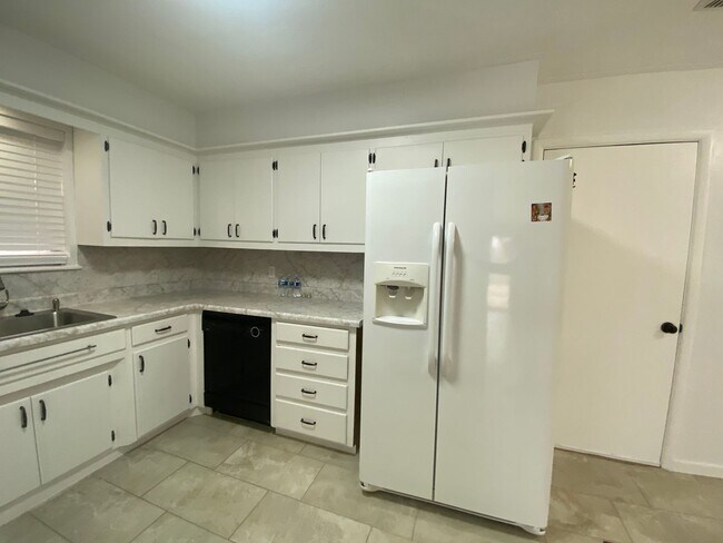 Photo - 3 bedroom 2 bath with extra storage!