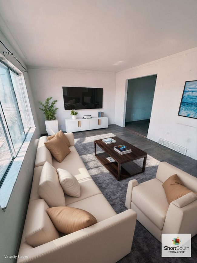 Building Photo - Updated - 2 bed 1.5 bath, Duplex with attached garage and fenced in backyard