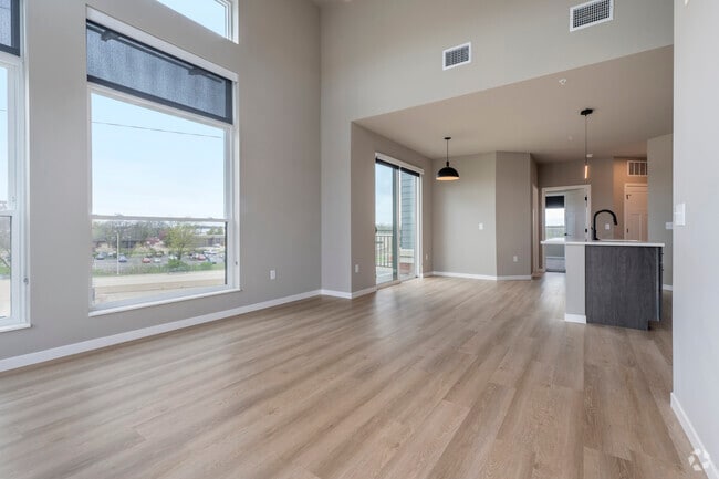 2BR, 2BA - 1198SF - Living Room/Dining Area