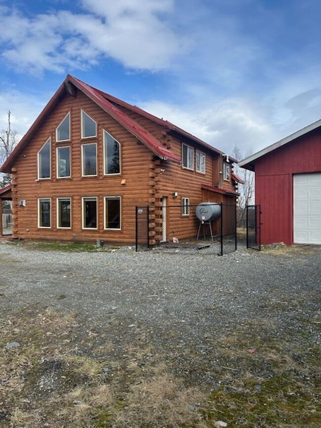 Photo - Gorgeous Log Home with infloor heat.  Two level lots with RV parking and dumpstation.
