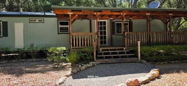 Building Photo - 2 bedroom 1 .5 bath home in the country