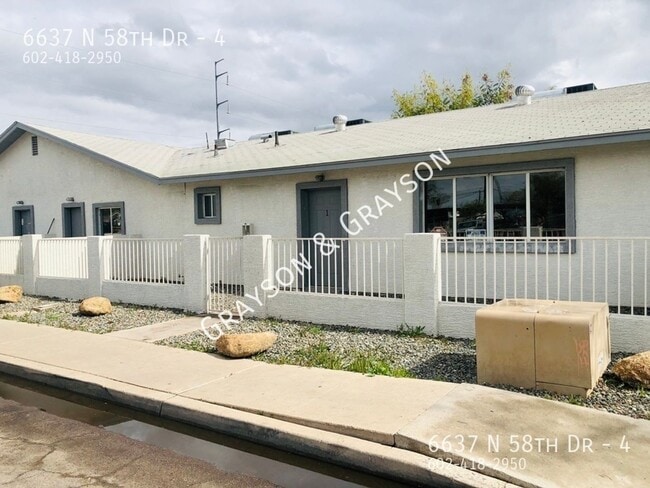 Building Photo - 6637 N 58th Dr Unit 4 Rental