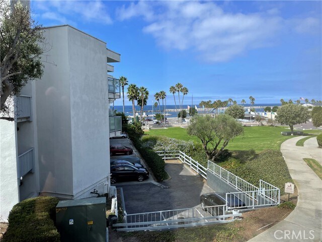 Building Photo - 250 The Village Unit 113