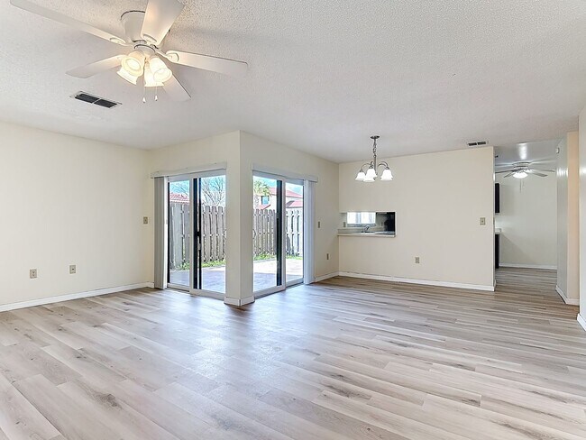 Photo - Spanish-Style 3 Bedroom, 2.5 Bath Mediterranean Rooftop Townhouse – Basic Cable & Wi-Fi Included!