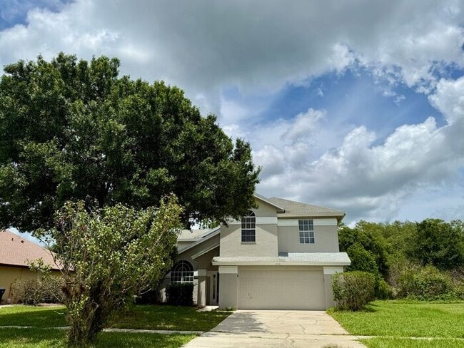 Building Photo - LARGE AND SPACIOUS 4/3 HOME IN EAST ORLANDO WEDGEFIED COMMUNITY