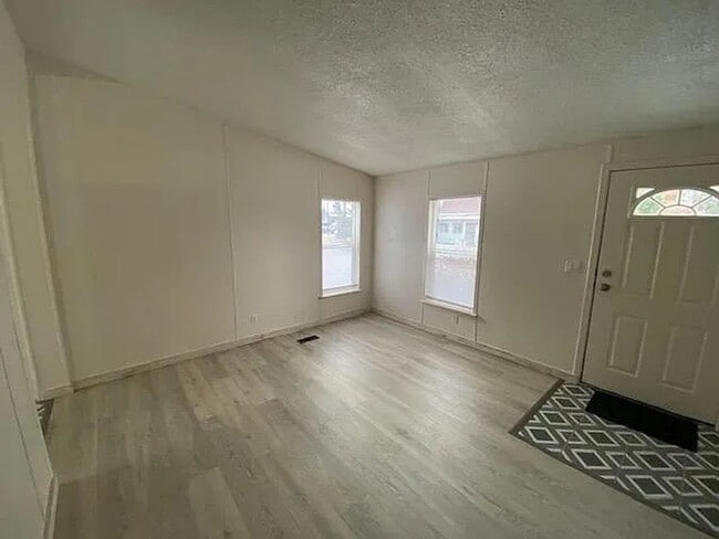 Photo - Charming 3 Bedroom Home in Quiet, Tree Lined Neighborhood
