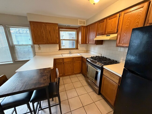 Building Photo - 8039 W Grand Ave Unit 1S
