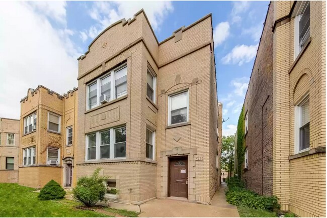 Building - 5725 N Bernard St Apartments Unit 1