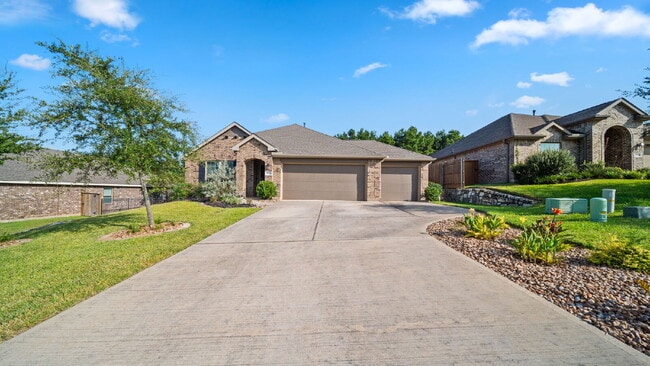 Building Photo - Welcome to this beautifully maintained one-story home offering 4 bedrooms, 2.5 bathrooms, and a s...