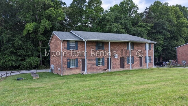 Building Photo - 2 Bed/1.5Ba - Includes - Water, Septic, Trash & Lawn - Sect 8 Unit #10