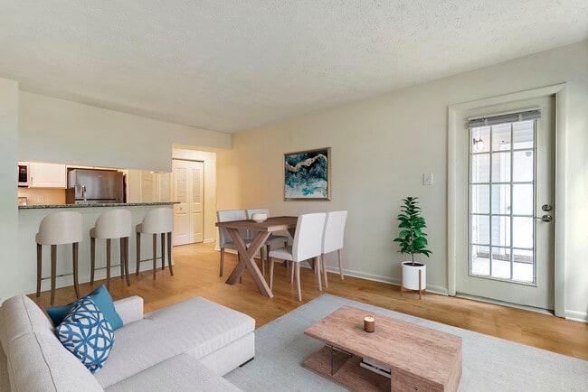 Upgraded Package II kitchen, living and dining area - eaves Columbia Town Center Rental