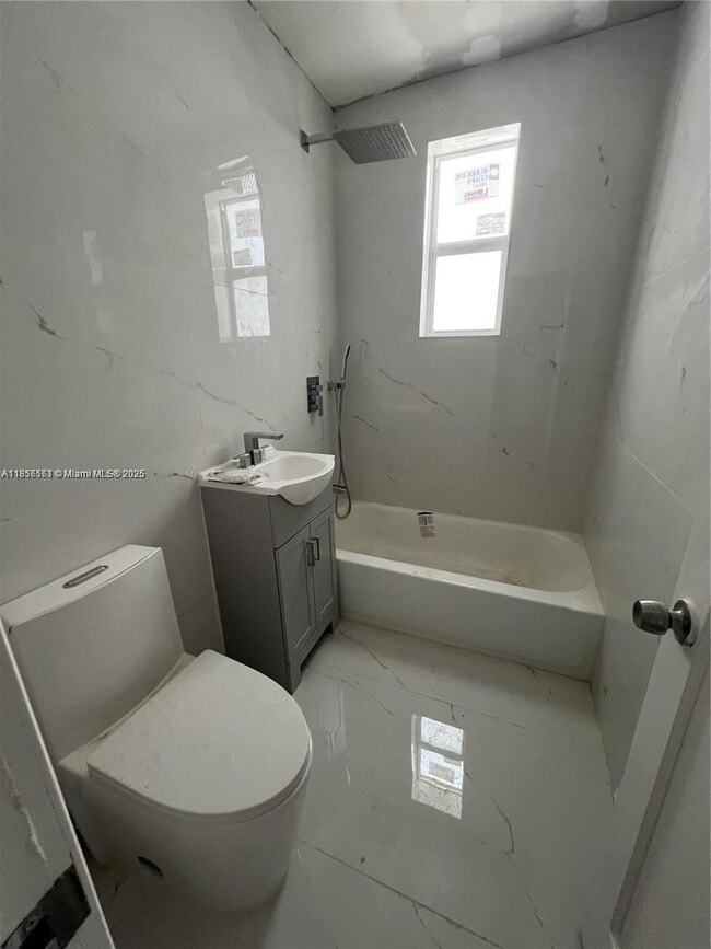 Building Photo - 7920 Harding Ave Unit 4 Rental