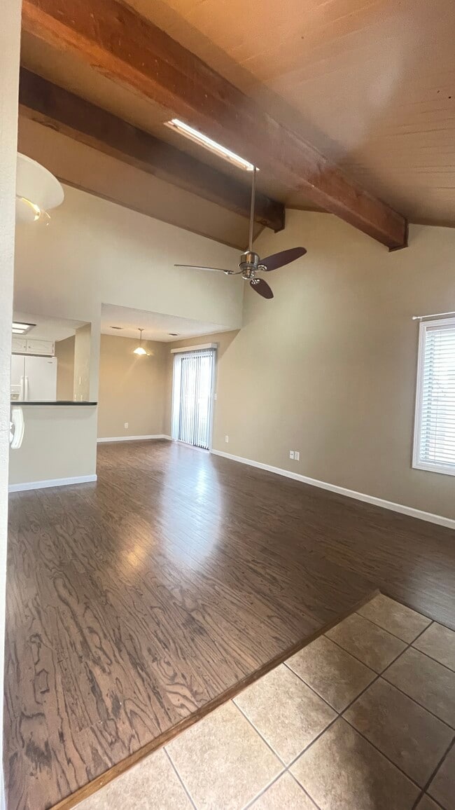 Entrance to Home with Vaulted Ceiling and Skylight - 3440 S Delaware Ave Unit 102