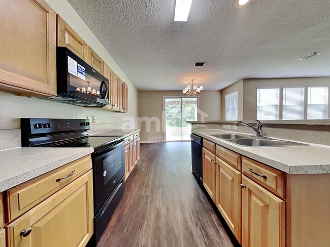 Photo - 11293 Justin Oaks Dr N