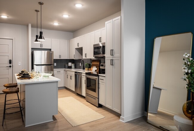 1 Bedroom Kitchen with stainless appliances and granite countertops