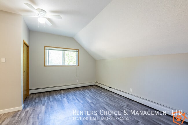Photo - MAIN FLOOR UNIT With Assigned Parking and Onsite Laundry