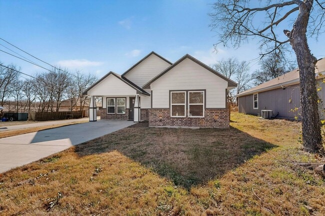 Photo - Bright Corner Lot Home with Open Living and Island Kitchen