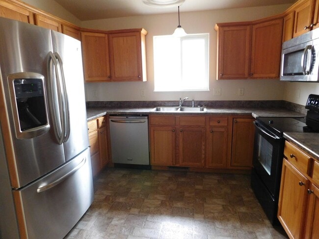 Photo - Charming 3 Bed, 2 Bath Townhome with Single-Car Garage