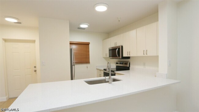 Photo - 4455 Botanical Pl Cir Unit 5-104