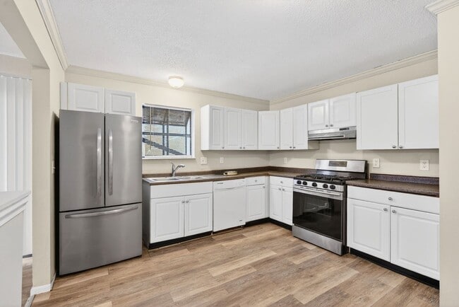 Photo - Updated Single-Family Home with Large Yard