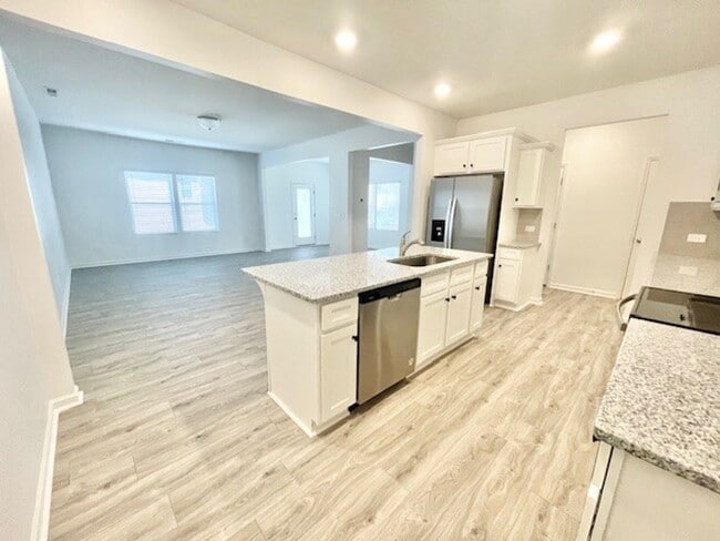 Photo - 3 br 2.5 ba with spacious loft home 2 car garage Ready APRIL 24TH