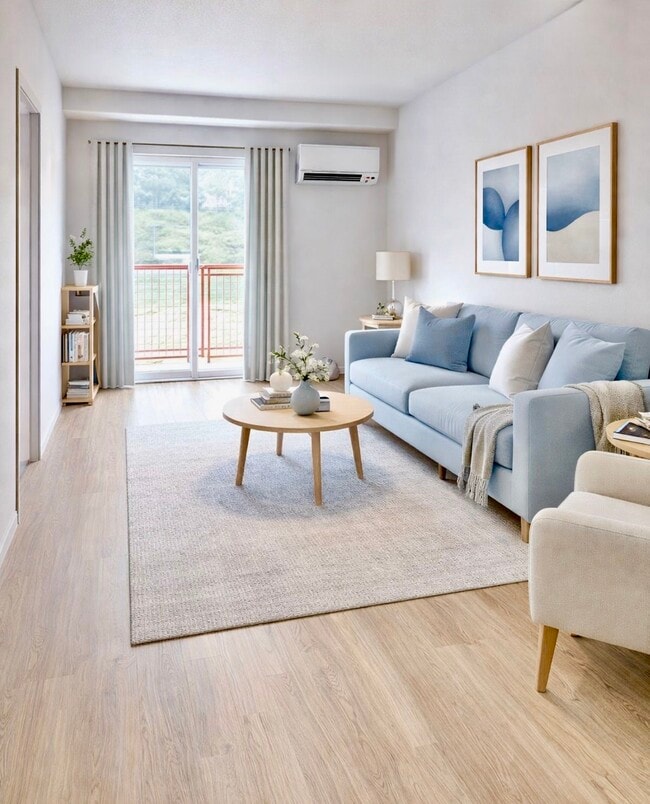 Living room with Balcony - The M Apartments