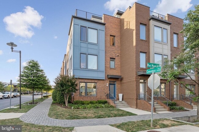 Building Photo - Perfectly located just steps from the Red Line Metro, this EYA-built Davis Model townhome at West...