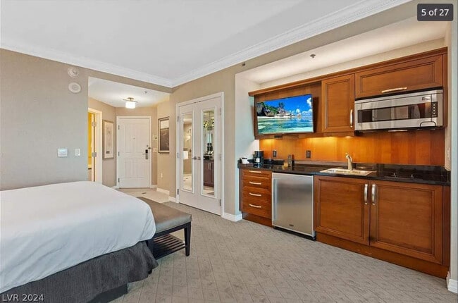 Building Photo - 145 E Harmon Ave Unit FL21-ID1332448P