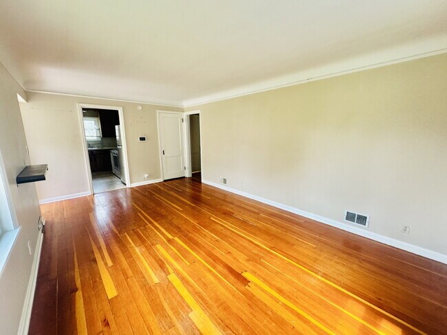 Photo - Charming 4-Bed Home with Gleaming Hardwood Floors, fully fenced backyard - 1500 Sq Ft in Minneapo...