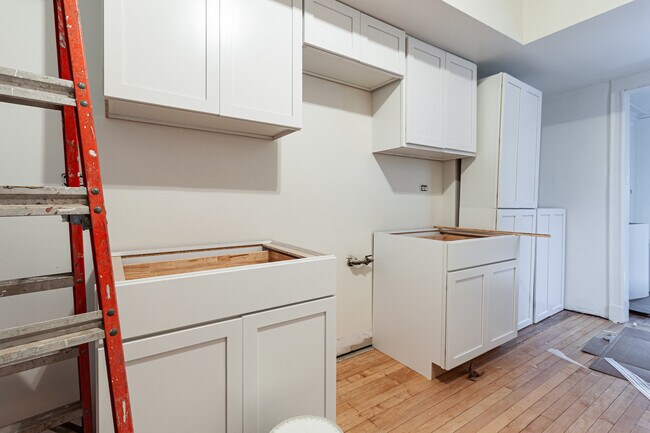 Will be getting quartz counters and hardware on cabinets - 910 W Belle Plaine Ave