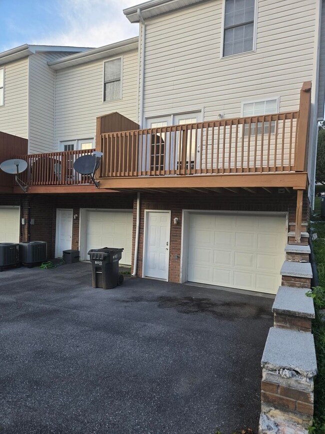 Photo - Spacious 2-Bedroom Townhome – End Unit with Private Deck & Garage