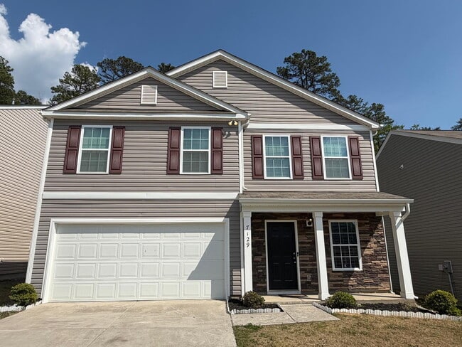 Photo - "Charming 3-Bed Oasis on Finnigan Rd: Spacious 1,994 Sq Ft with Granite Kitchen & Cozy Fireplace!"