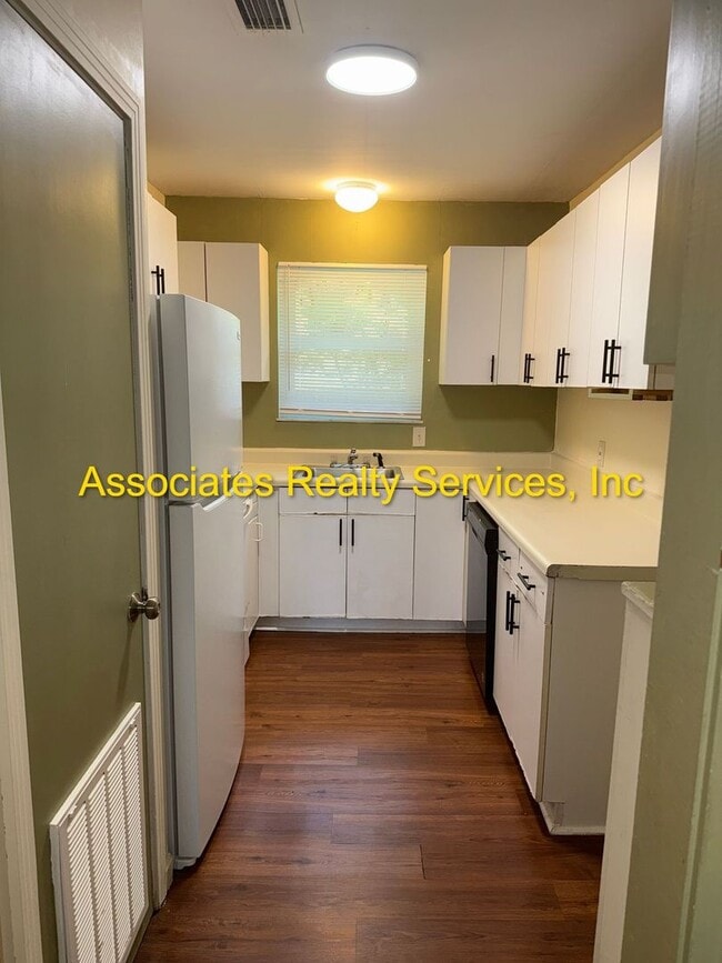 Photo - 7 Blocks to Campus! 3 Bed, 2 Bath with a Fenced Backyard and Large Sunroom