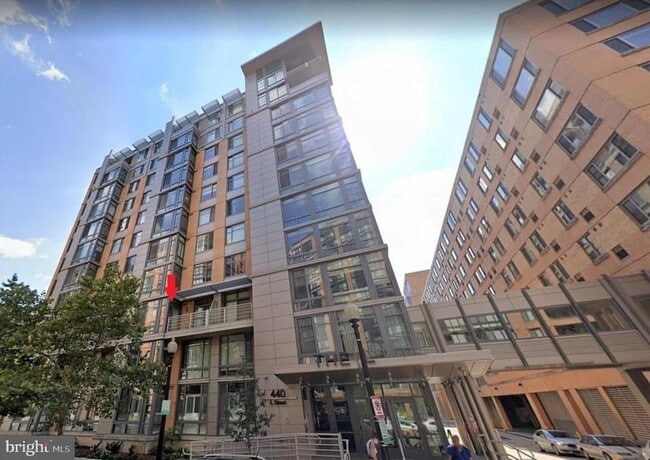 View from street, see red arrow for unit location. - 440 L St NW Unit 304